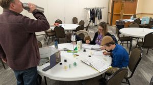 Players working intently on Swords & Wizardry