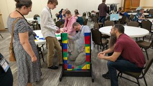 I don't recall what this game is, but this family was enjoying.